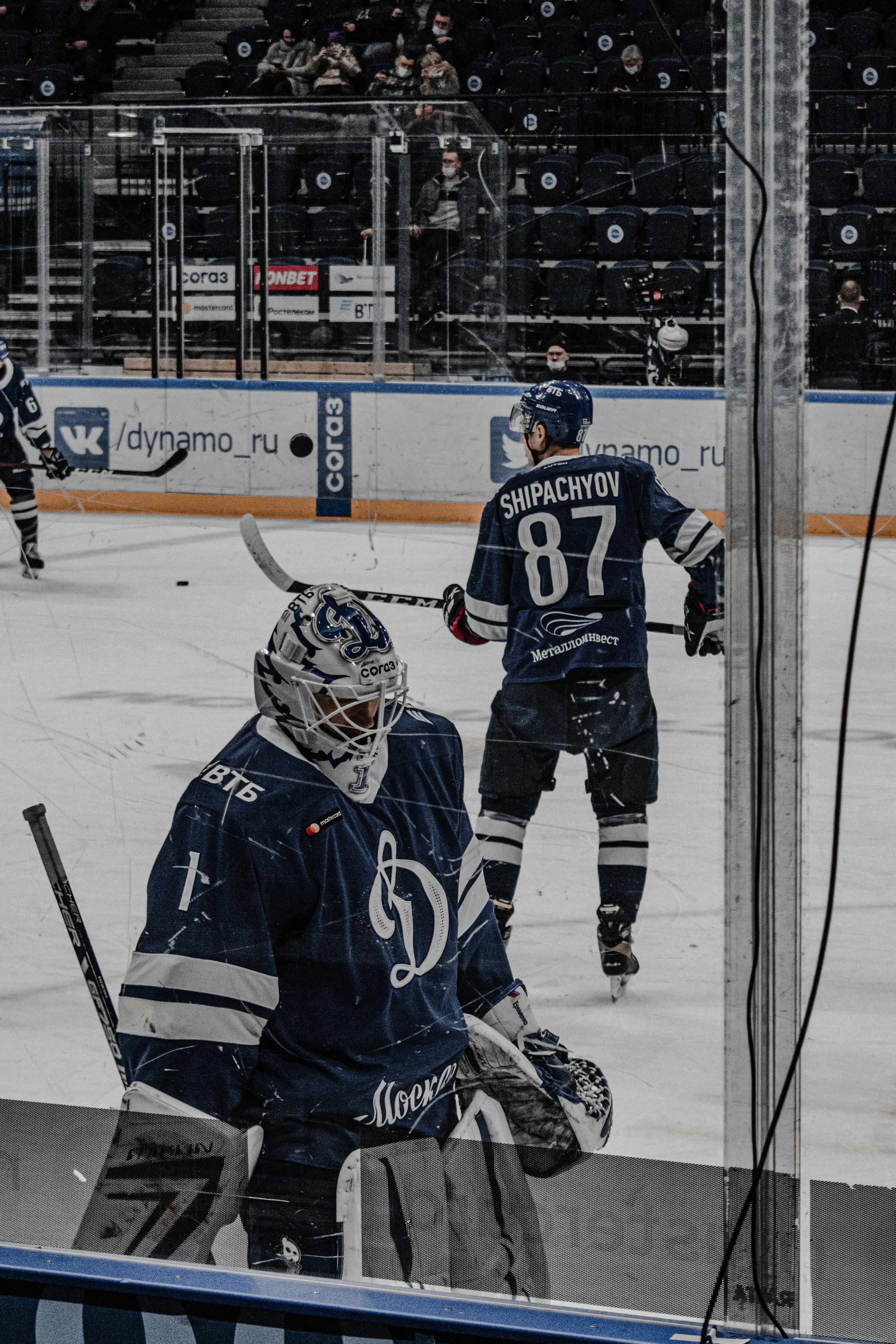 2 men in ice hockey jersey playing ice hockey